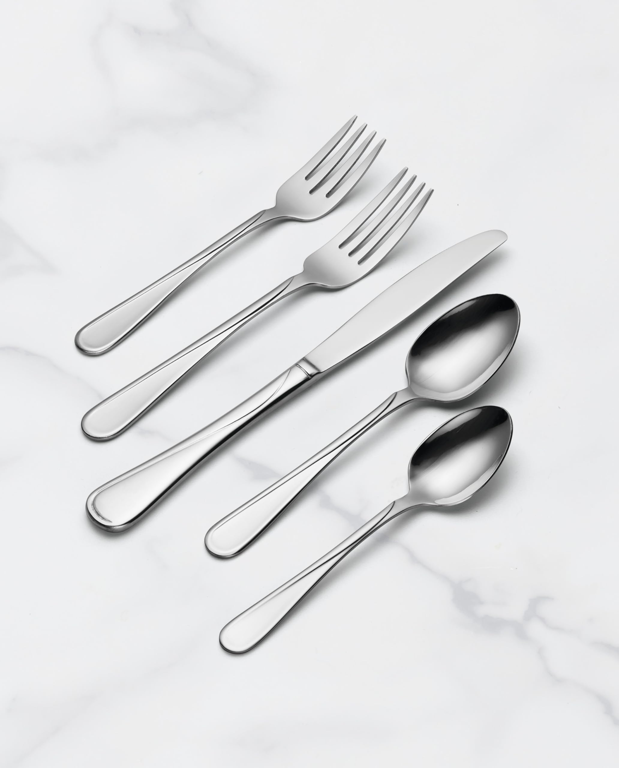 Oneida Flight spoon and fork beside a ruler showing scale and true-to-size proportions