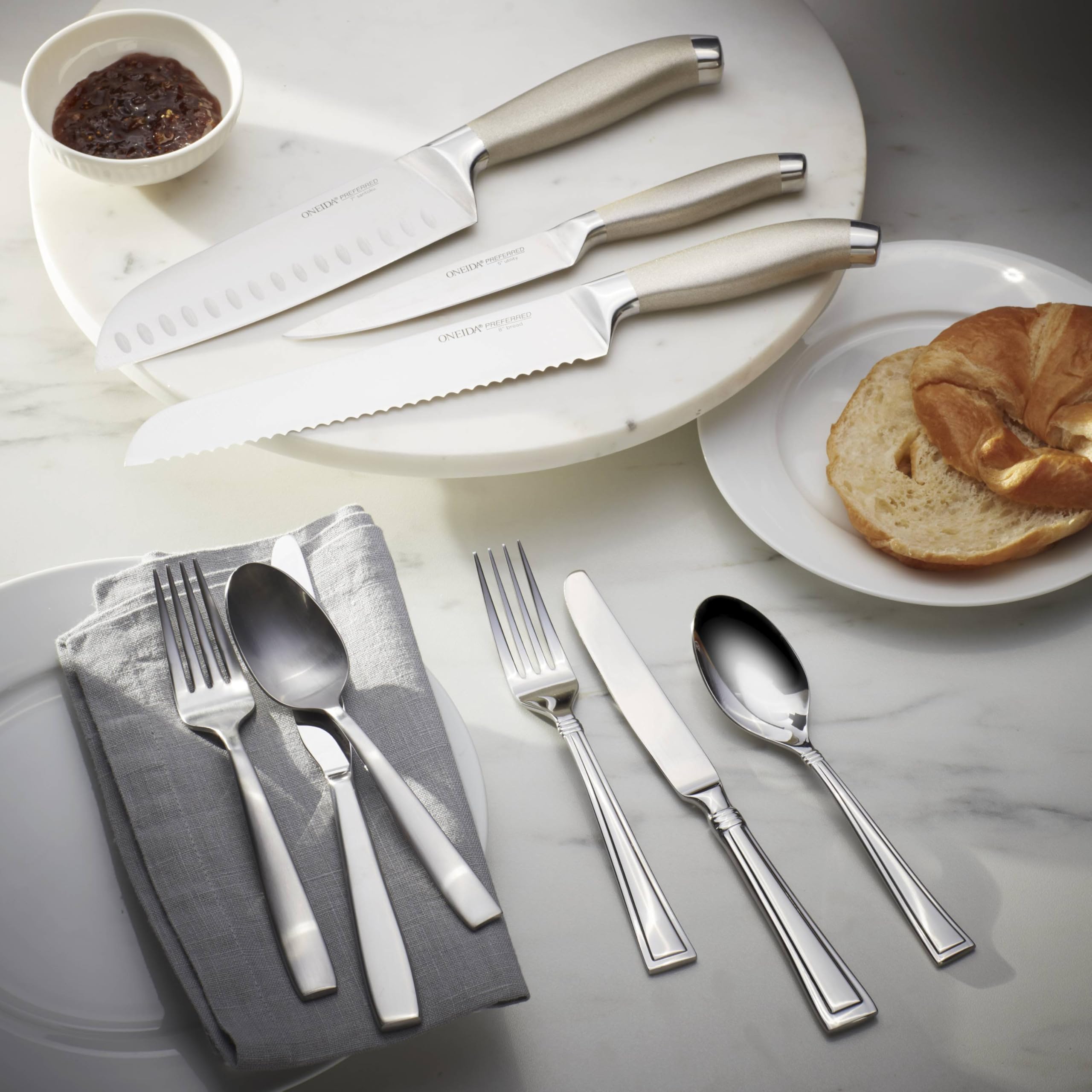 Oneida knives on a dining table demonstrating comfortable grip and professional presentation benefit