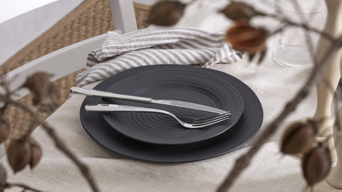 Oneida Oakwood reflective mirror finish capturing light and polished aesthetics