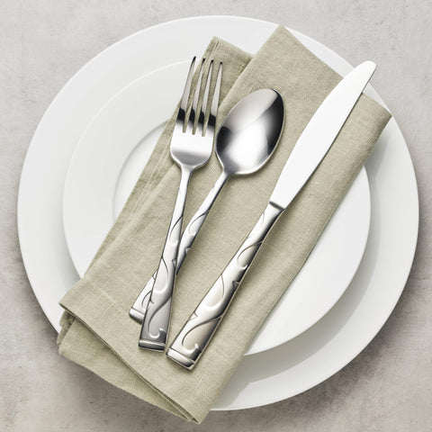 Oneida Tuscany held in hand to show scale and comfortable, balanced design