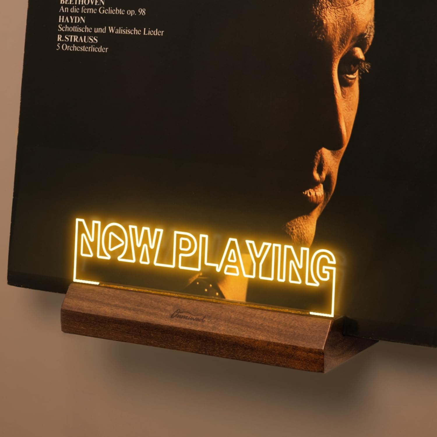 Onmiwod front view showing mounted vinyl and clear display, highlights album art