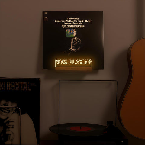 Onmiwod displayed beside turntable in living room adding decorative focal point