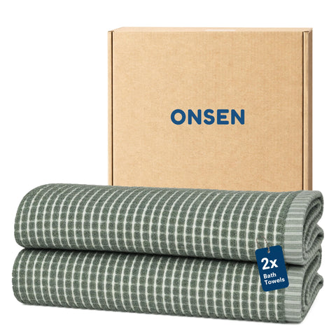 ONSEN folded front view showing spruce color and neat edges, highlights quick-dry benefit
