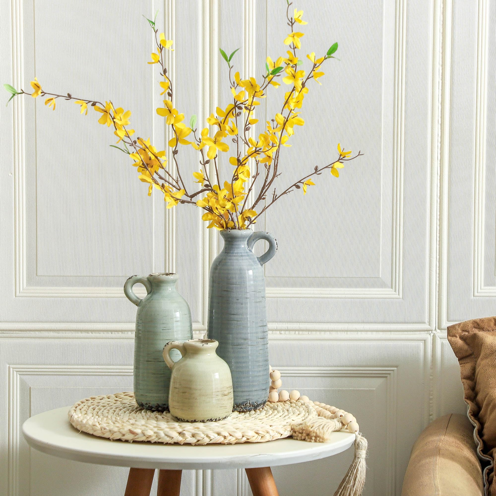 ooit small vase holding a single stem for focused minimalist accent