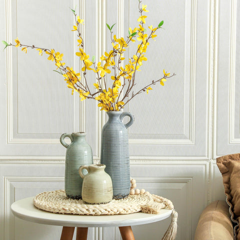 ooit small vase holding a single stem for focused minimalist accent