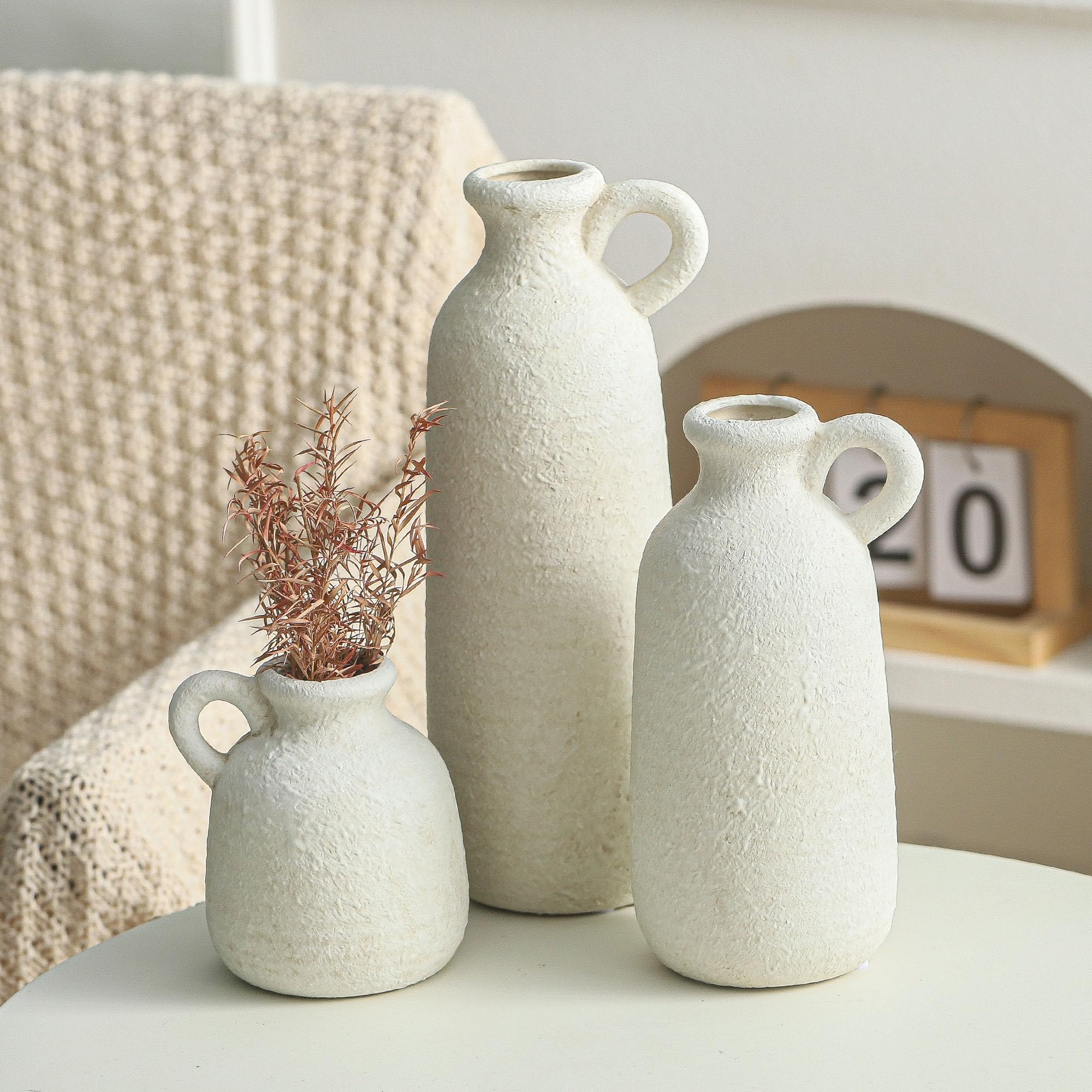 ooit vase handle detail emphasizing easy carrying and styling