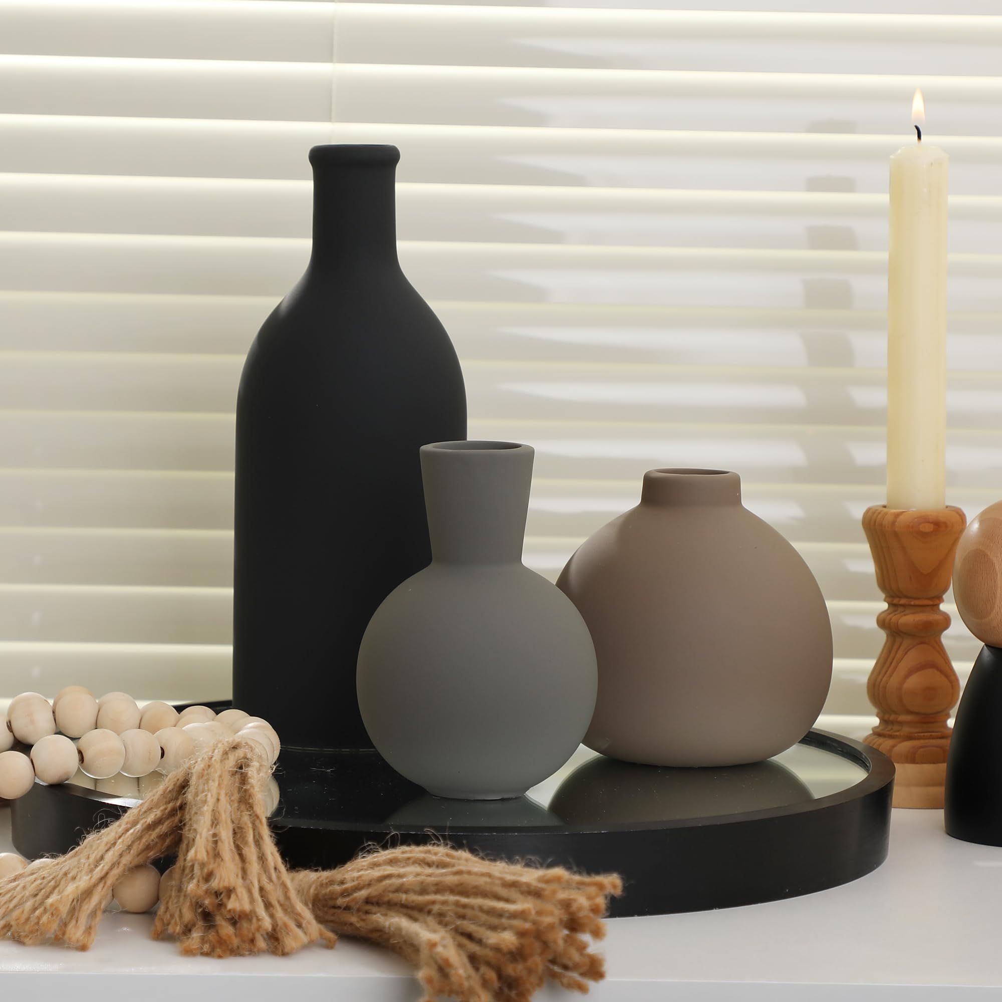 ooit styled mantel with trio showing cohesive decor and layered styling