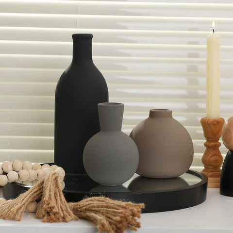 ooit styled mantel with trio showing cohesive decor and layered styling