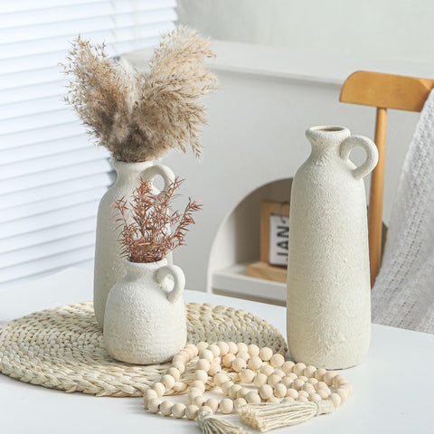 ooit mid-size vase on bookshelf offering layered decor benefit