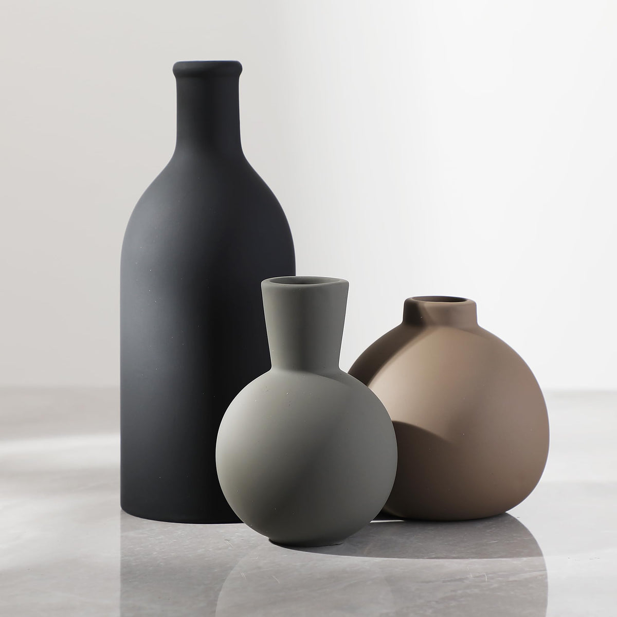 ooit ceramic vase set front view showing neutral colors and balanced trio benefit