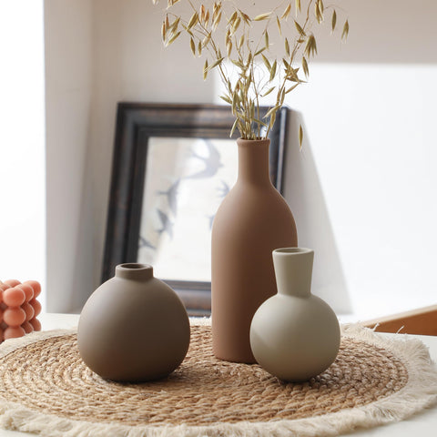 ooit vases styled on mantel showing cohesive farmhouse look and room-enhancing benefit