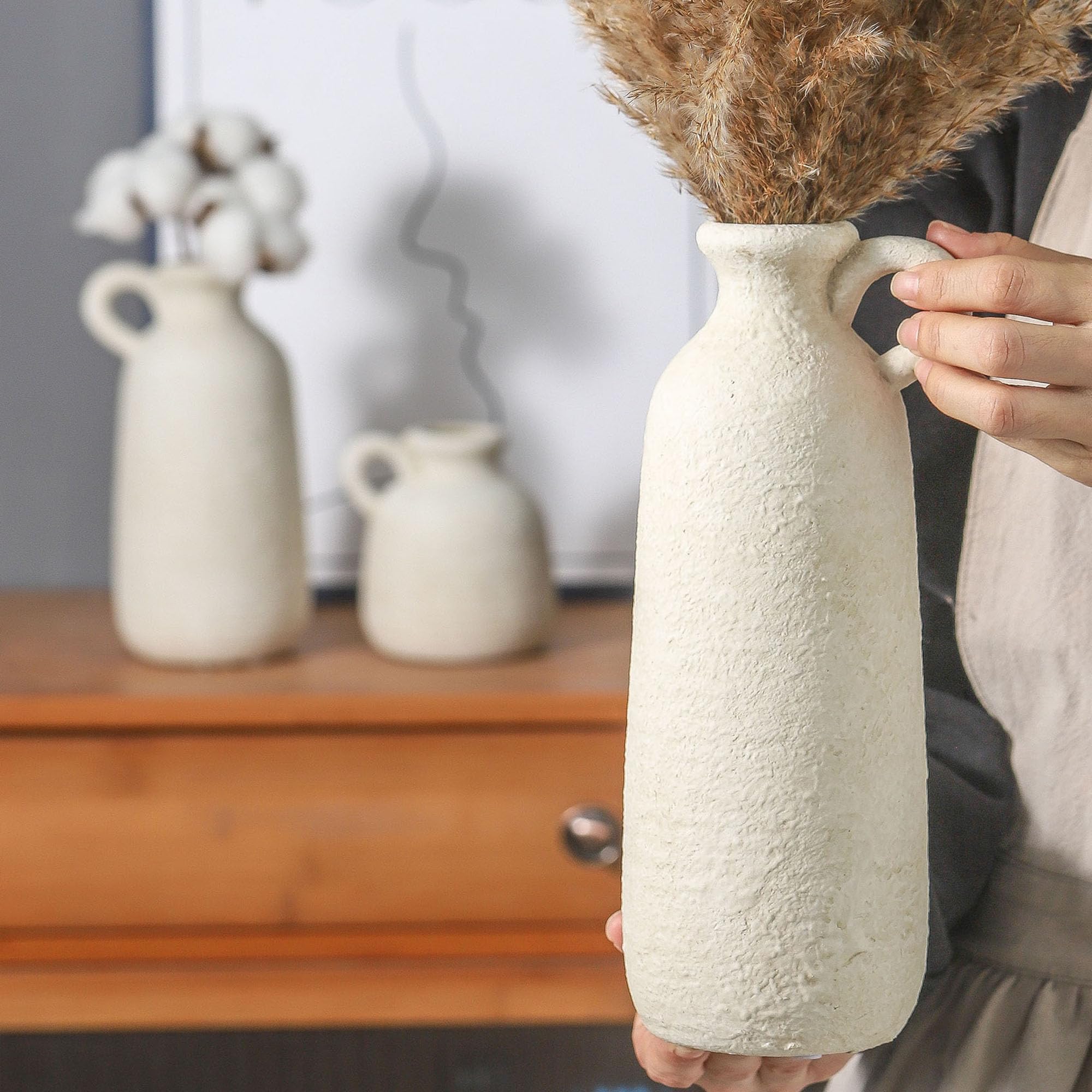 ooit vases with flowers on table showing instant centerpiece upgrade