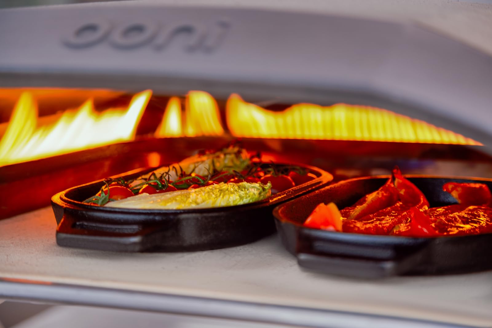 ooni Grizzler inside ooni pizza oven illustrating high-heat compatibility and performance
