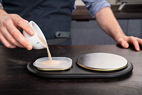 ooni lifestyle shot with scales beside pizza oven for streamlined prep
