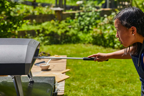 ooni peel in oven action rotating pizza for even browning benefit