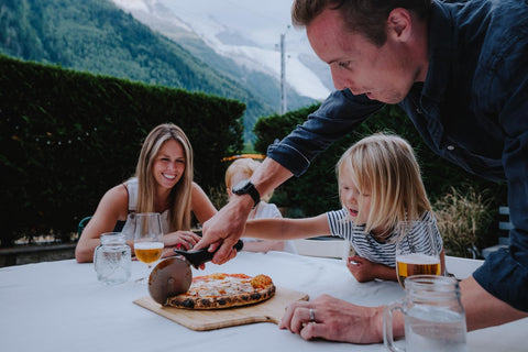 ooni peel in oven transfer action illustrating effortless pizza launching