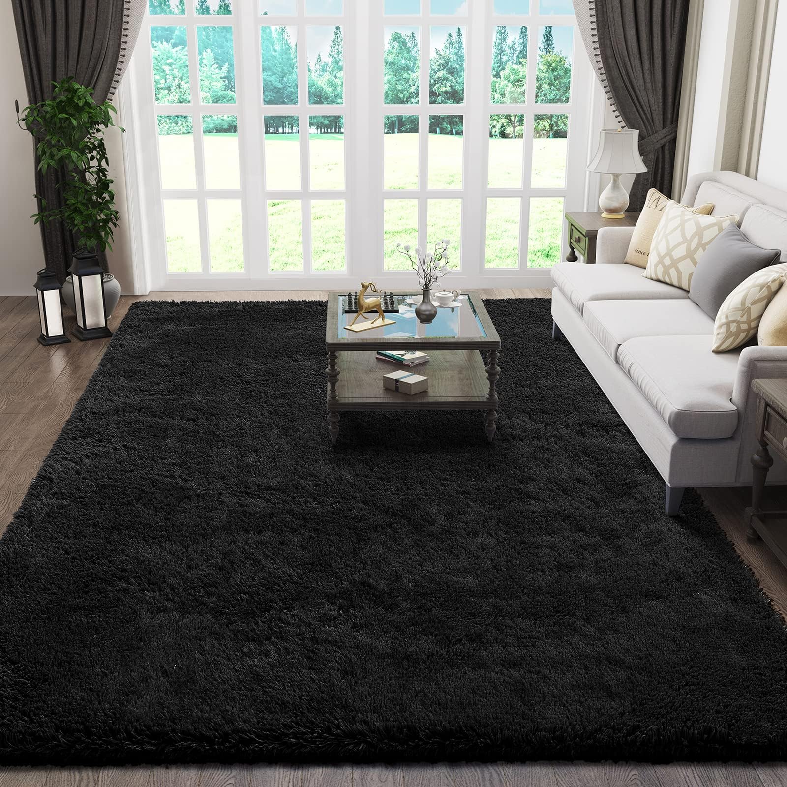 Ophanie black rug front view showing plush pile and neat edges, adds warmth