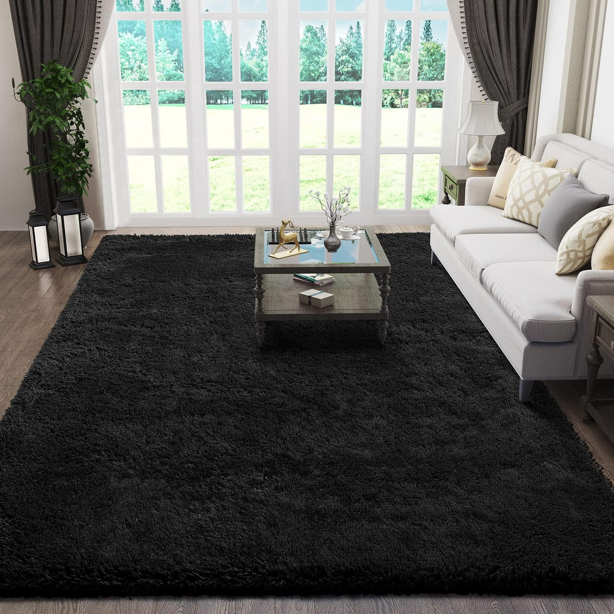 Ophanie black rug front view showing plush pile and neat edges, adds warmth