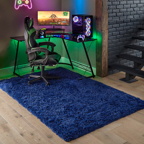 Ophanie rug beside chairs showing 3x5 scale and space fit