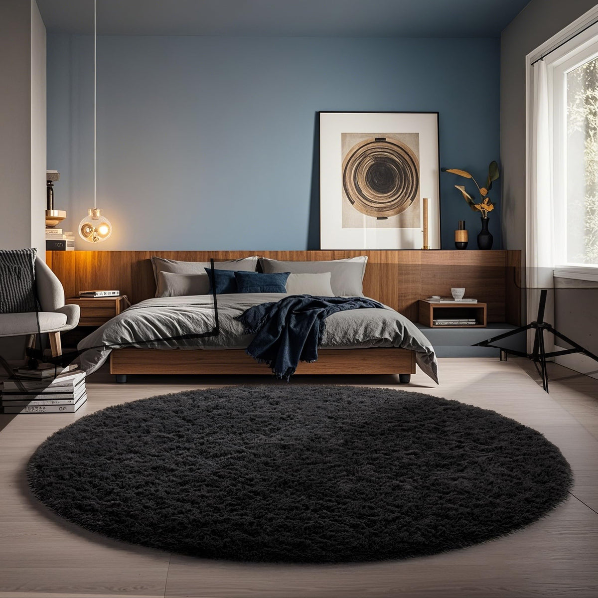 Ophanie round rug front view showing plush black surface and soft texture benefit