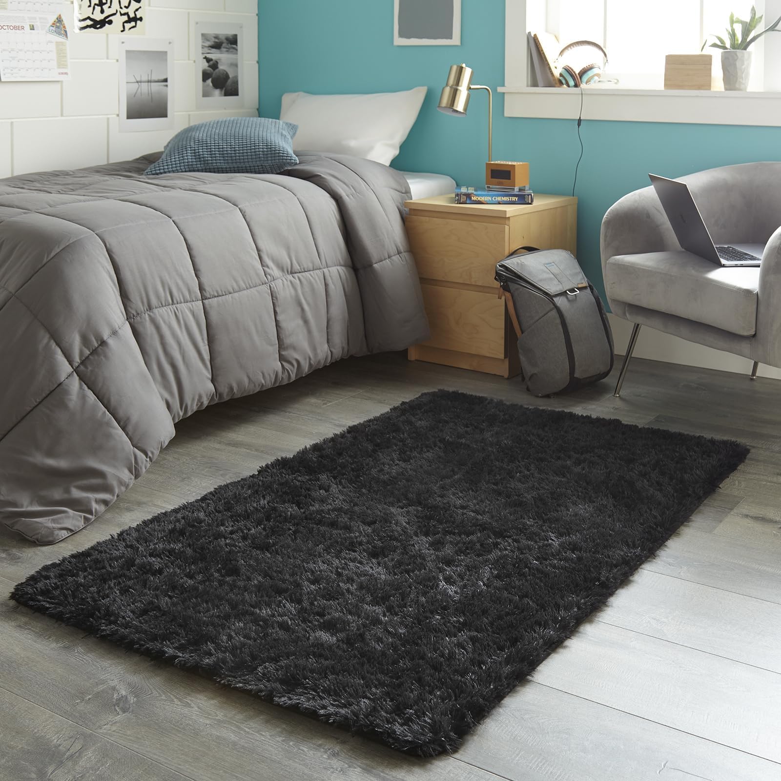 Ophanie next to bed for scale illustrating compact size and bedside comfort