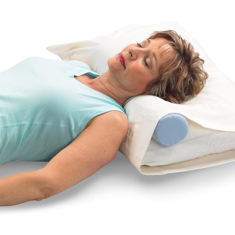 OPTP McKenzie cervical roll on a made bed demonstrating practical use