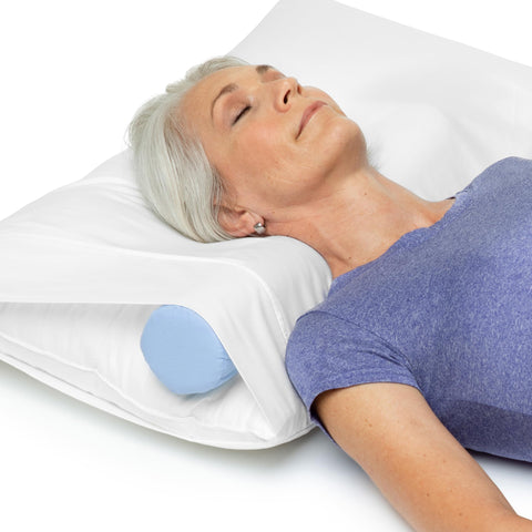 OPTP McKenzie cervical roll paired with pillow to enhance neck alignment