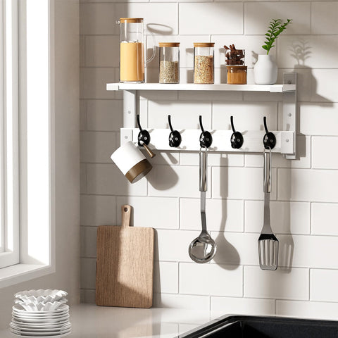 Oraich mounted in bathroom holding towels, brand keeps items accessible
