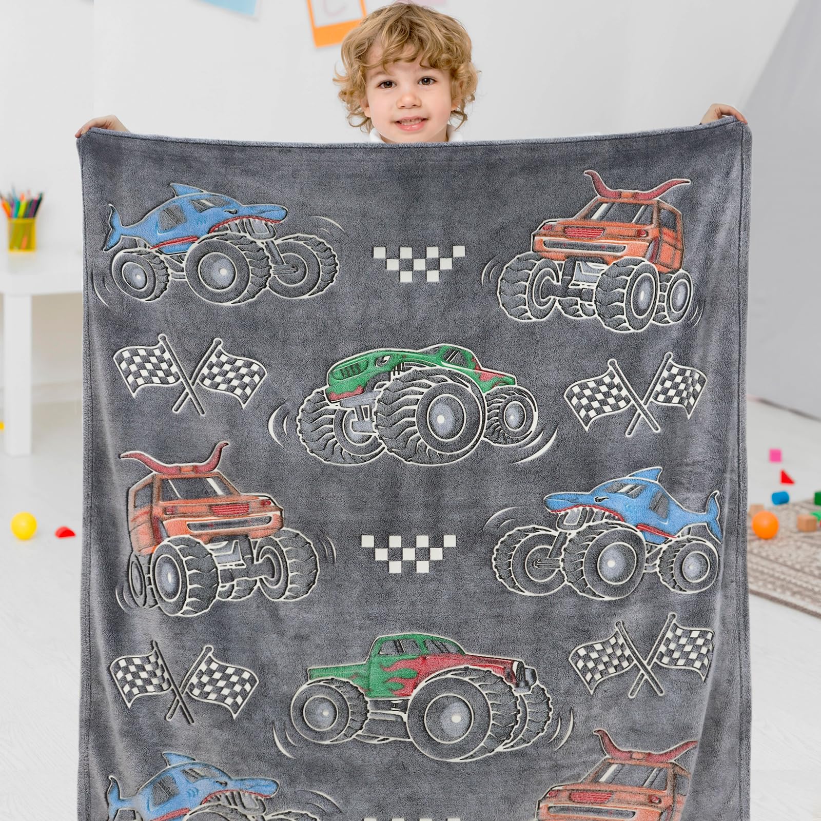 ORDM blanket beside chair to show the large 60x80 size