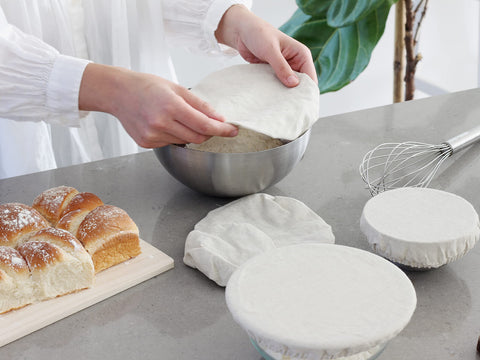 Organic Cotton Mart cover on serving dish in stylish kitchen, eco-friendly presentation
