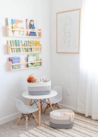OrganiHaus in nursery holding toys showing tidy kid-friendly storage benefit