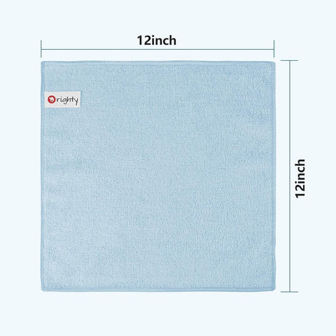 Orighty washcloth held in hand showing 12x12 inch portable size