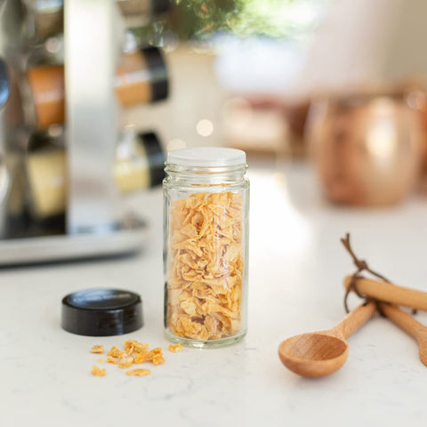 Orii overhead shot of jars labeled with common spices for quick selection