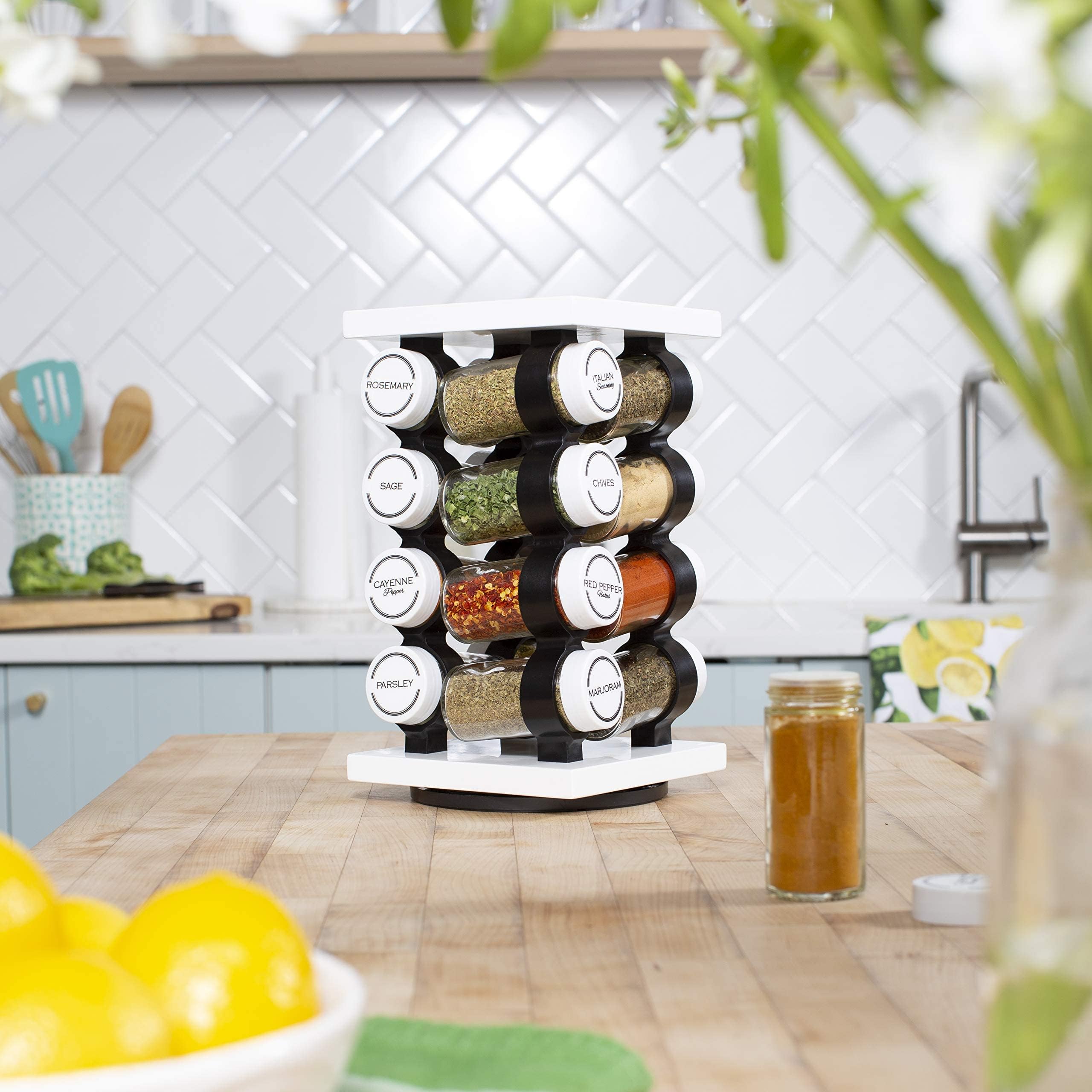 Orii spice rack next to spoon showing scale and space-saving footprint
