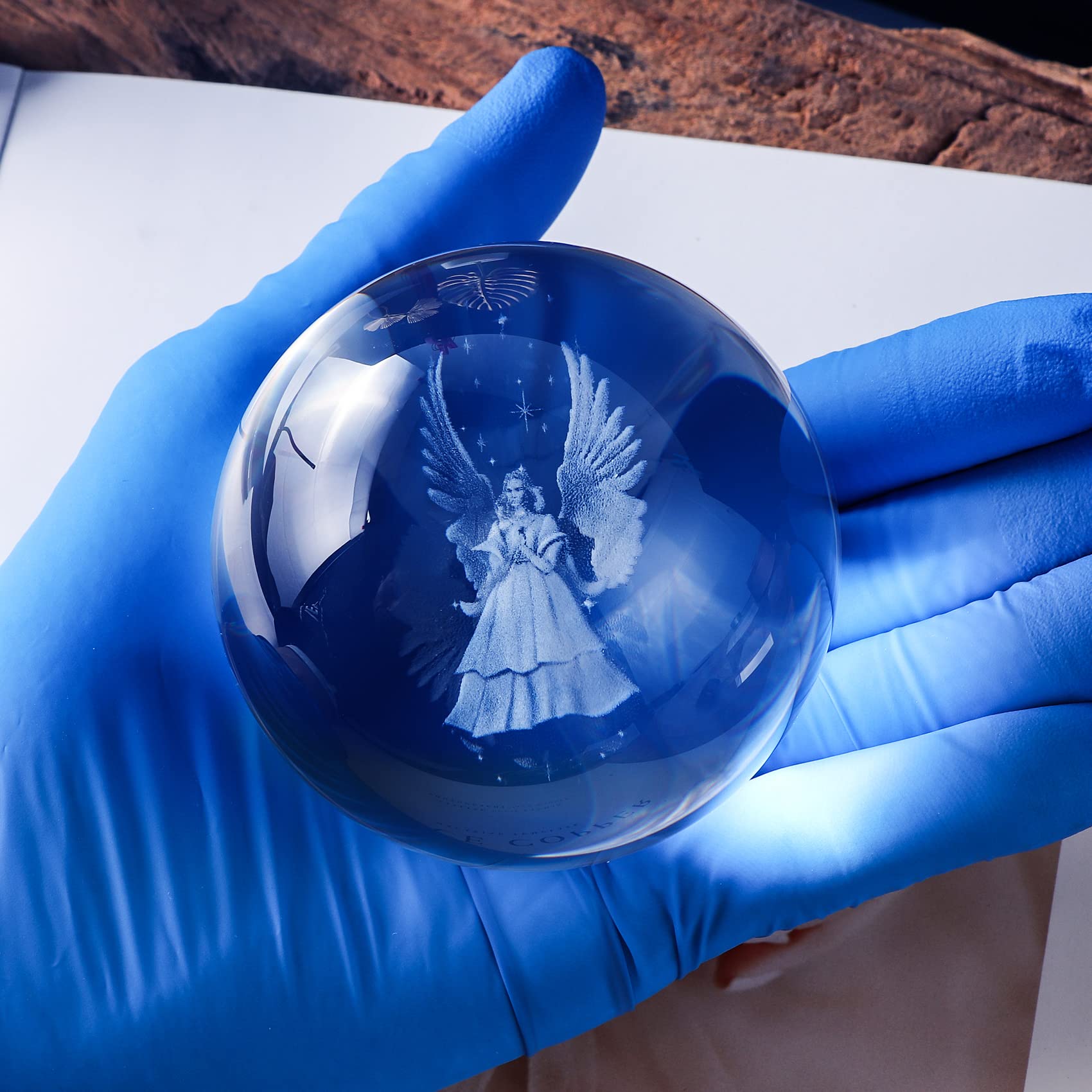 Ornalrist gift box open with crystal ball ready for gifting