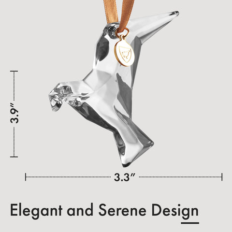 Orrefors Homage Dove in hand to show size and collectible weight