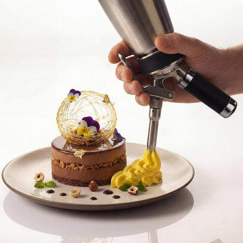 OSJ COOK held in hand to show 500 mL scale and portable convenience