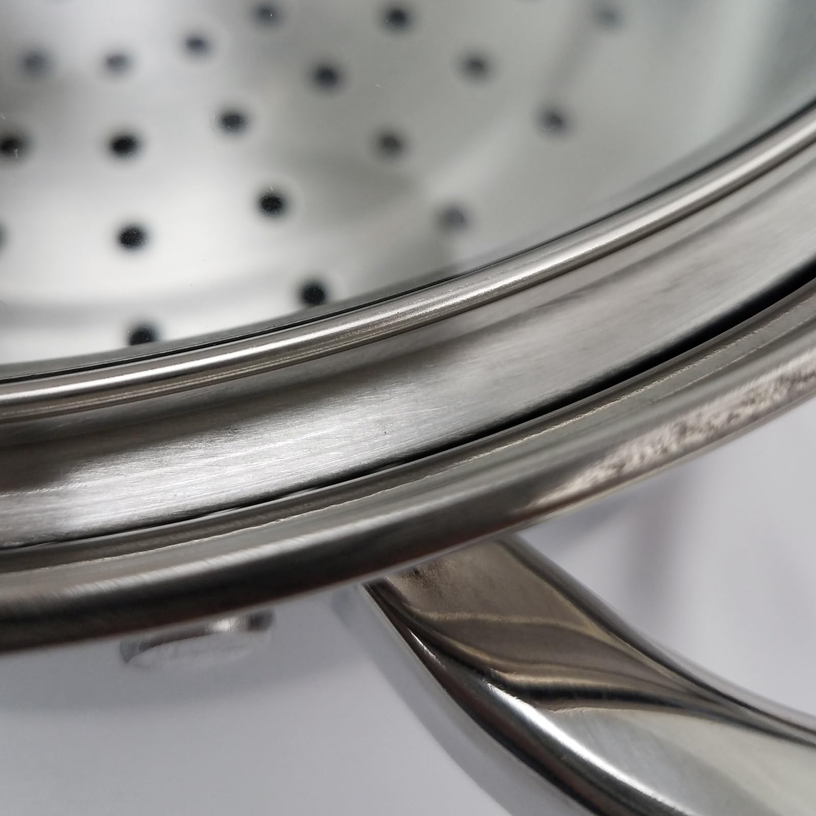 Oster Sangerfield tempered glass lid closeup allowing visual cooking checks
