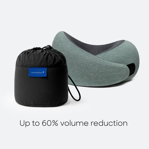 OstrichPillow GO next to water bottle showing compact travel scale