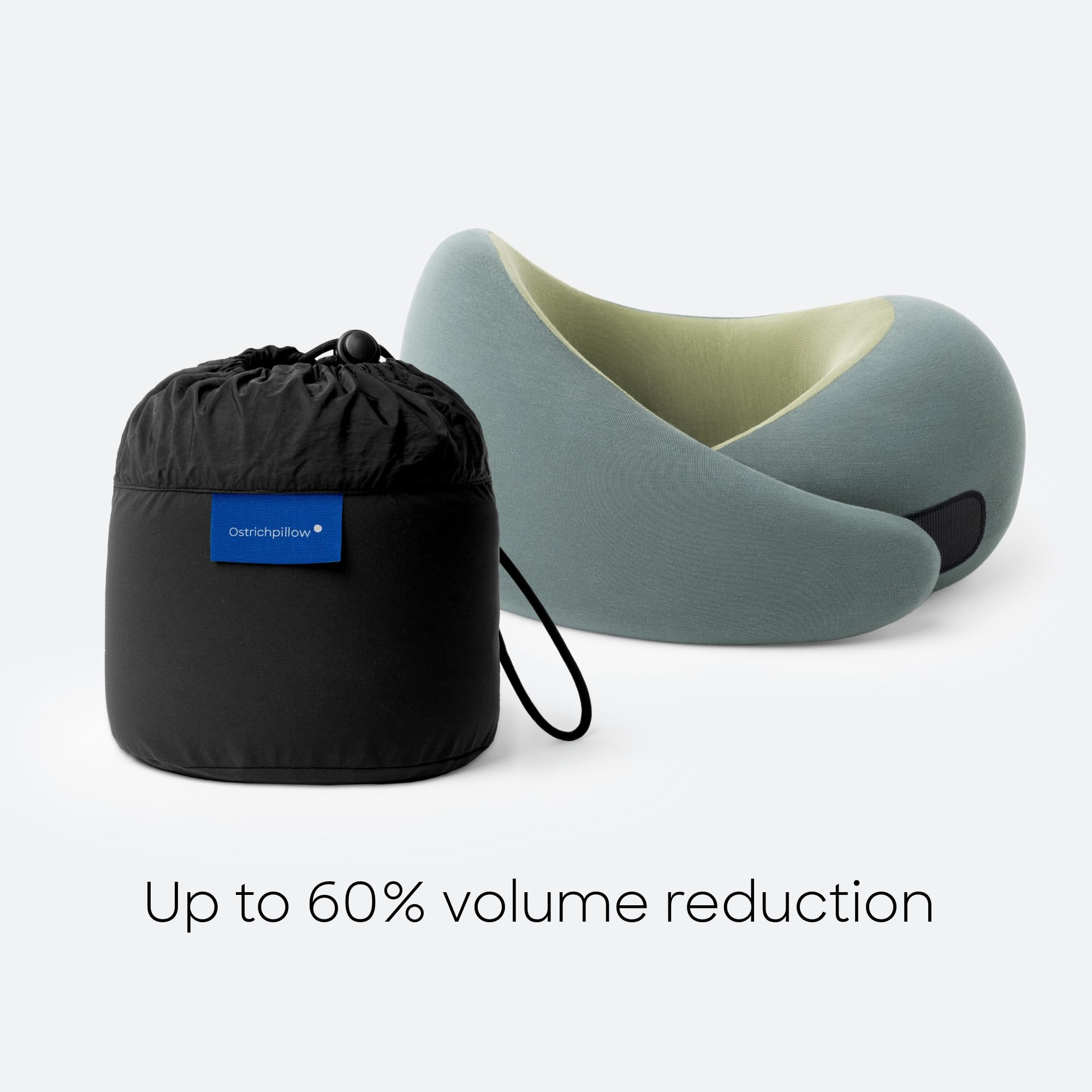 Ostrichpillow GO next to water bottle to show compact size advantage