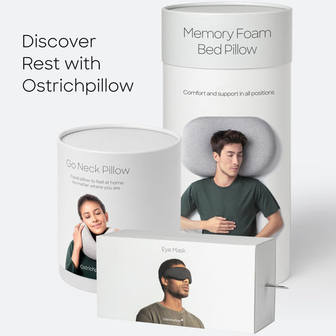 OSTRICH PILLOW in-use on train seat demonstrating restful travel support