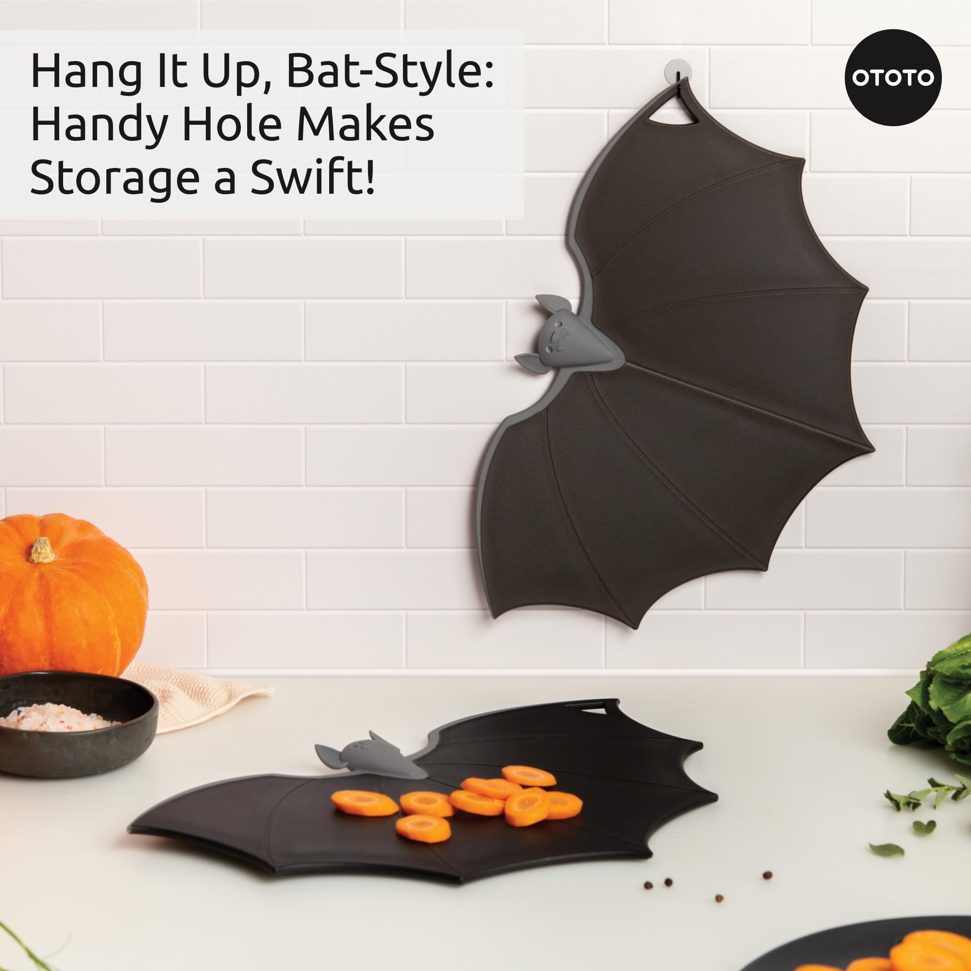 OTOTO Batty next to a chef knife demonstrating compact size advantage