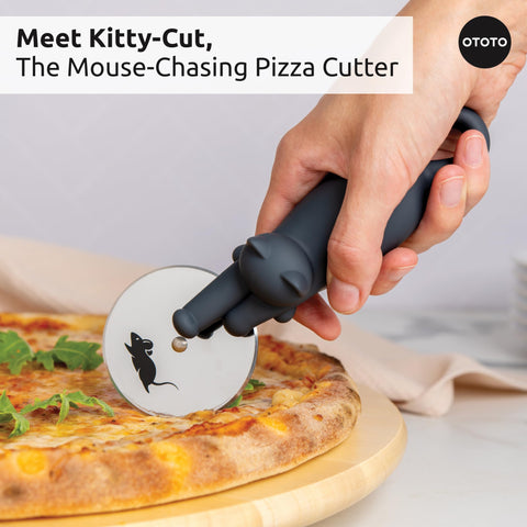 OTOTO Kitty Cut pizza cutter in use slicing pizza with stainless steel precision