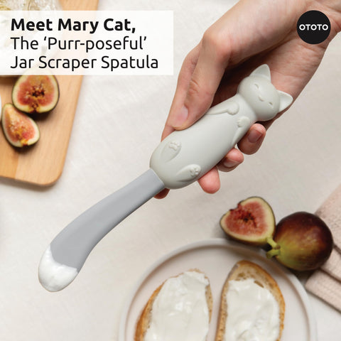 OTOTO Mary Cat tail edge close-up reaching jar corners to minimize food waste