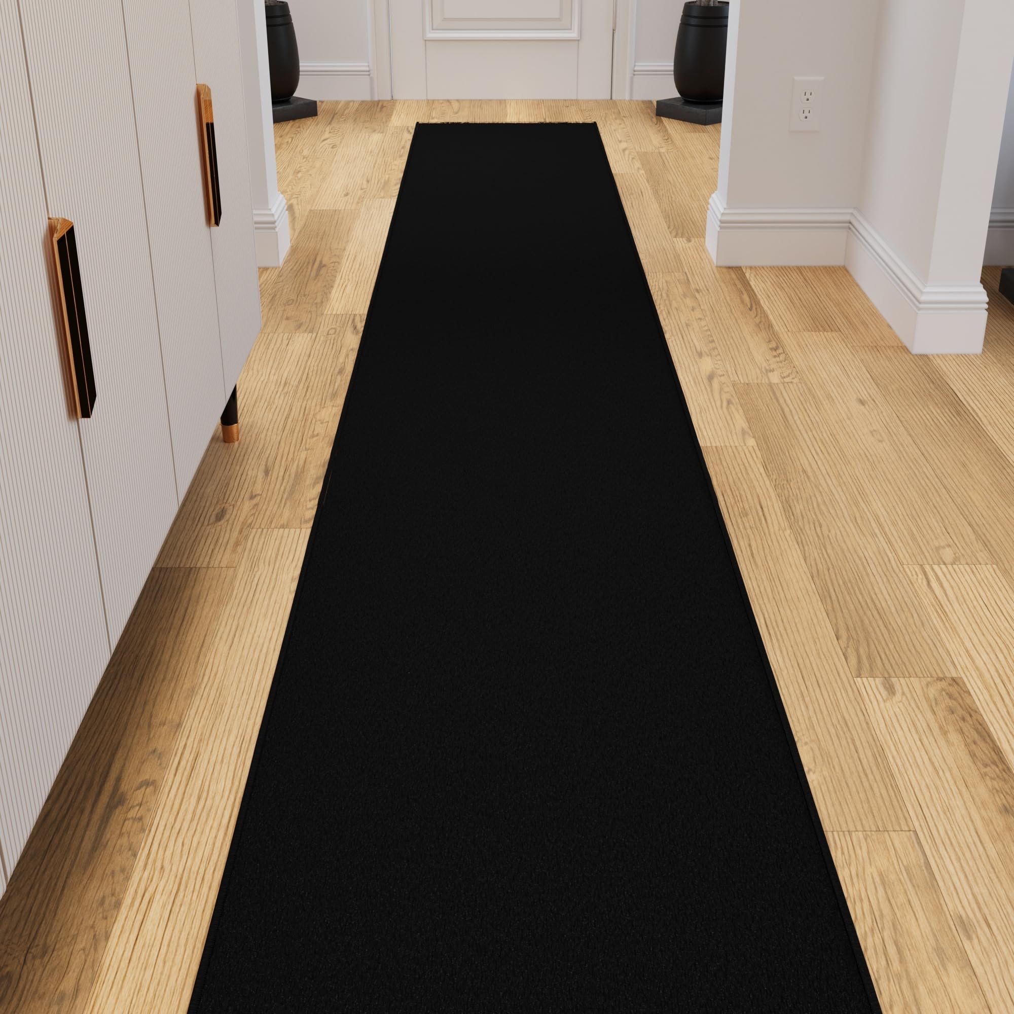 Ottomanson front view of black runner showcasing sleek hallway fit and versatile style