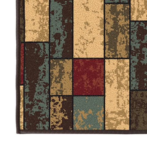 Ottomanson stain-resistant spot clean demo showing simple maintenance benefit