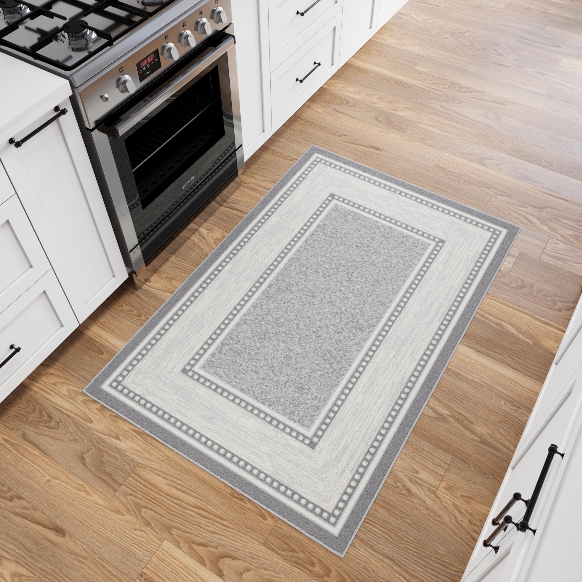 Ottomanson rug sliding-under-door example showing smooth clearance benefit