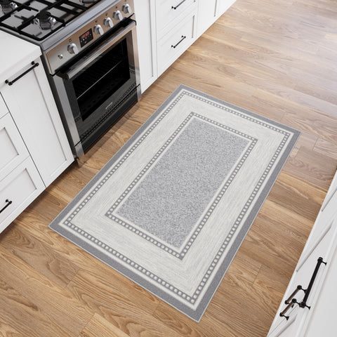 Ottomanson rug sliding-under-door example showing smooth clearance benefit