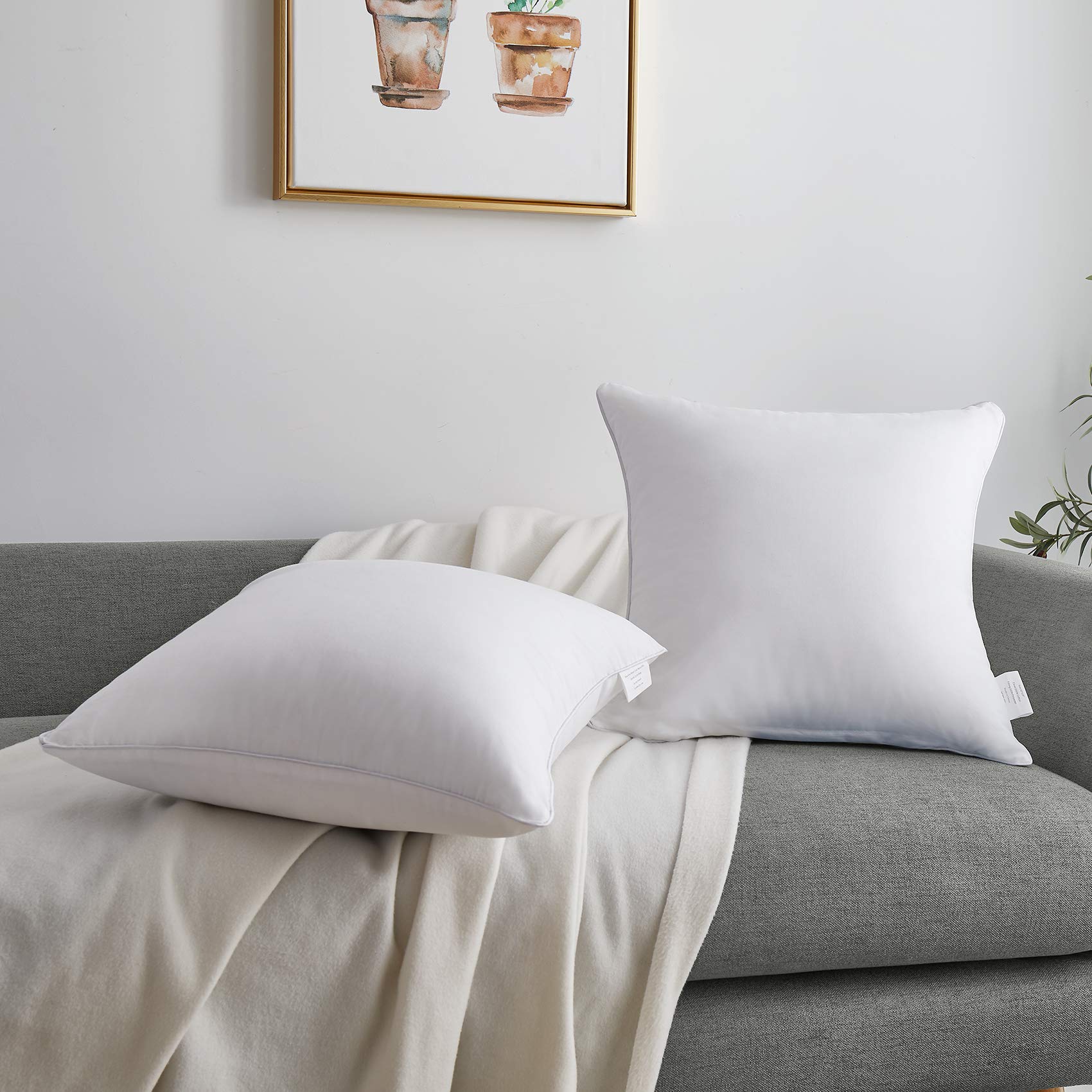 Oubonun inserts on bed emphasizing layered decor and comfortable back support