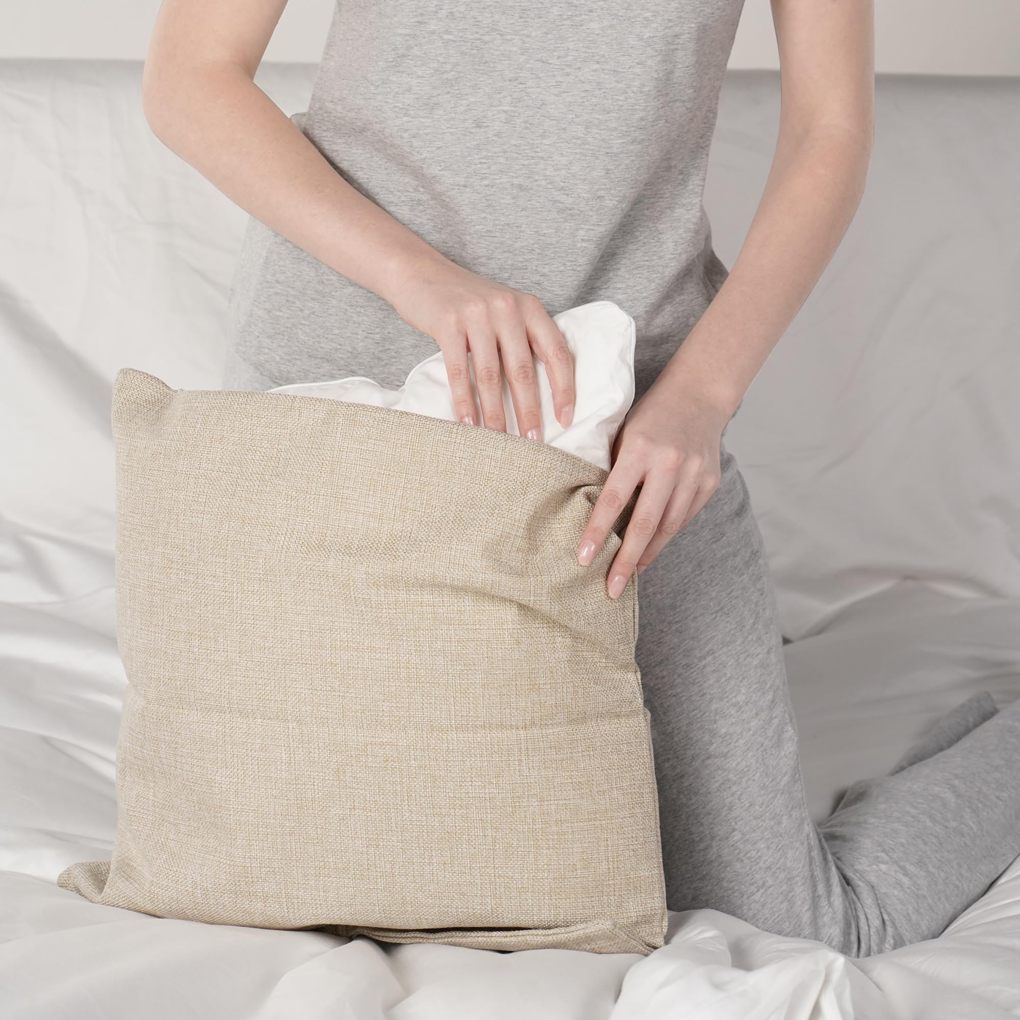 Oubonun insert inside cover on sofa illustrating fuller pillow appearance